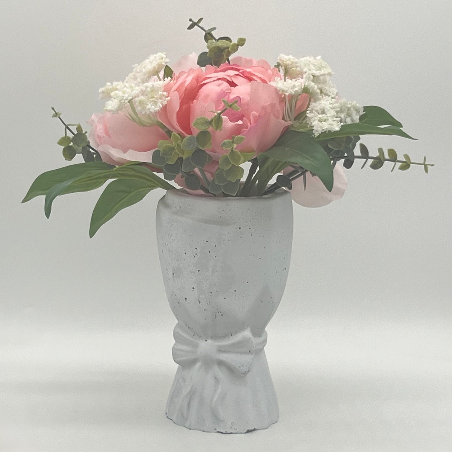 Pose vase med sløyfe